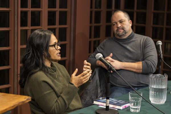 Ben Jealous listens to Camille Charles talk at a Kelly Writers House event
