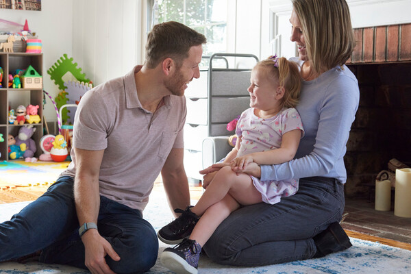 Benjamin Prosser with his daughter, Lucy, and wife, Erin.