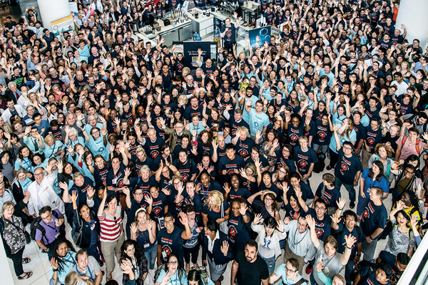 Aerial image of Penn Medicine staff in the atrium celebrating.