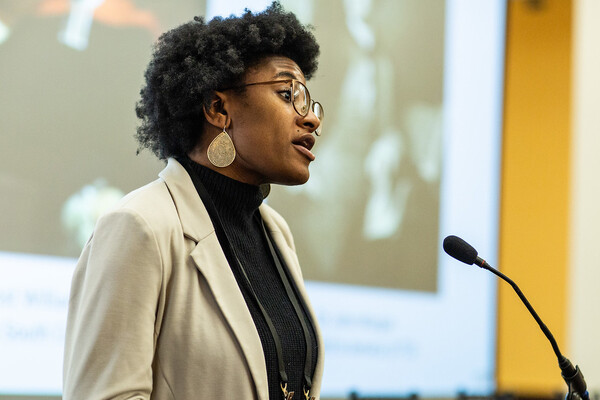 VanJessica Gladney speaking at a podium.