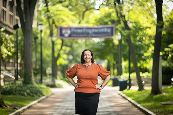 Chambrel Jones stands with her hands on her hips outside of the School of Engineering Building.