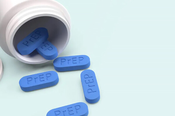 An open bottle of PrEP pills.