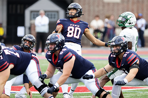 Albert Jang looks at his kick as it sails toward the goalposts against Dartmouth.