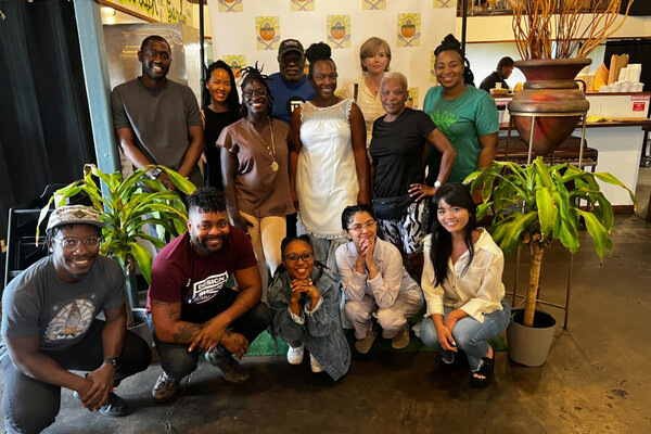 A group of people posing for the cameria in New Orleans.