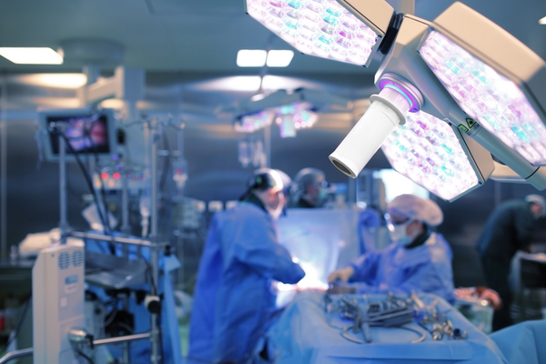 Doctors and nurses performing surgery.