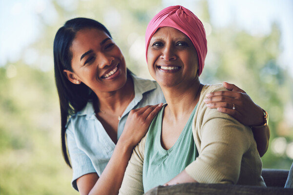 A cancer patient and their adult child.