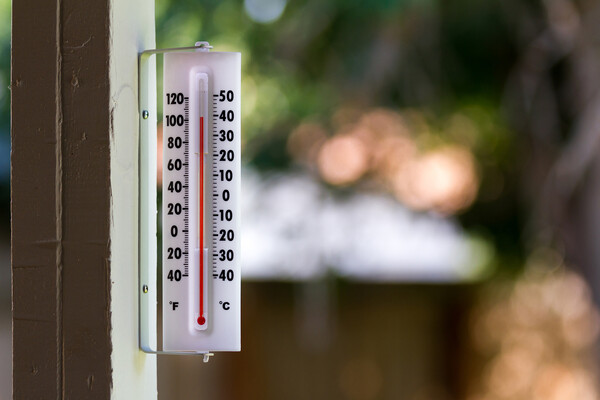 outdoor thermometer nearing 100 degrees.
