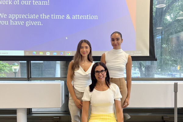 Sindi Banaj (left) and Maryem Bouatlaoui (right) with Gillian Bazelon (seated).