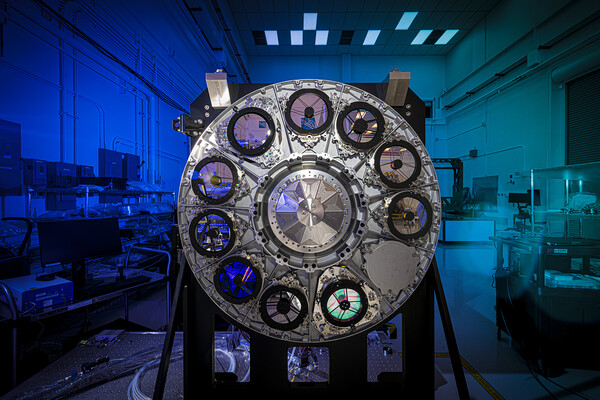 spy satellite in lab with blue background