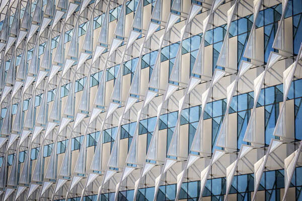 Sun shades attached to building windows.