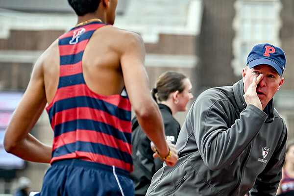 Steve Dolan calls out to an athlete during a meet.