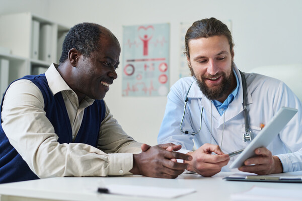 A doctor and patient.