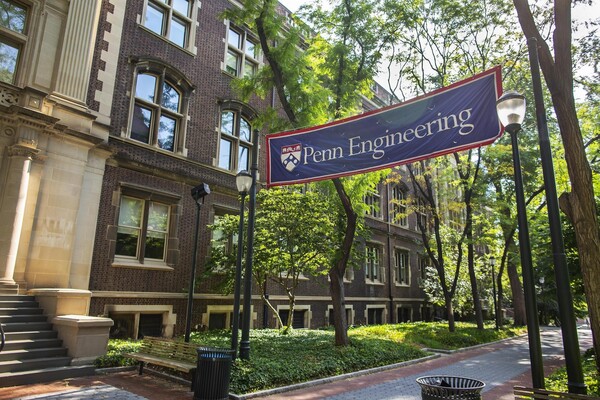 Buildings on Penn's campus and a banner that reads 'Penn Engineering.' 
