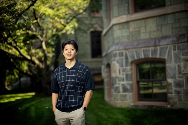 Eric Ryu stands outside of College Hall.