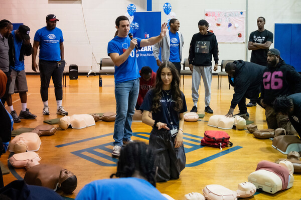 Josh Glick instructing a course on hands-only CPR at the Boys & Girls Club.