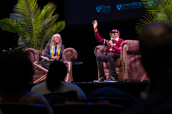 Spike Lee speaking on stage with Heather Williams.