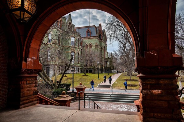 College Hall seen through the archway of Fischer Fine Arts.