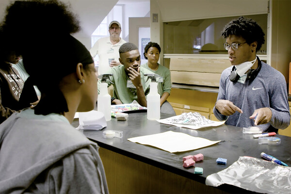 High school students in a science class.