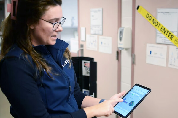 Felicia Divito with an iPad at New Bolton Center.