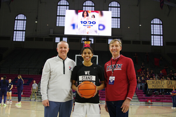From left, Coach Mike McLaughlin, Mataya Gayle, and President J. Larry Jameson.