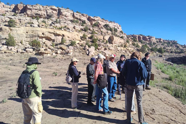 Max Taylor, a Hopi ethnobotanist, leads students on a site visit at the Hopi First Mesa Consolidated Villages.