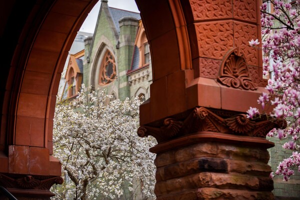 College Hall in spring with Fisher Fine Arts Library.