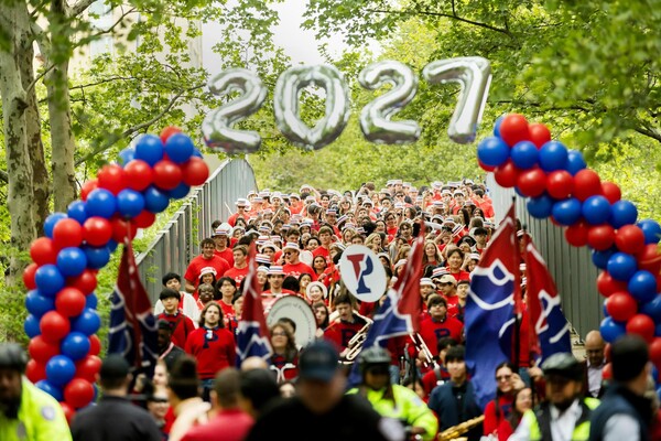 Penn’s Class of 2027 on the Locust Bridge during Hey Day.