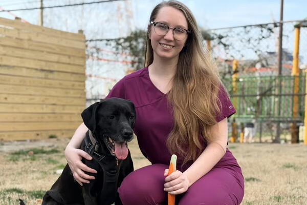 Penn Vet student Alison Kowalski and her Lab mix, Kona.
