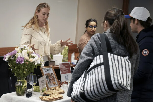 Emmy Keogh selling her butter at table.