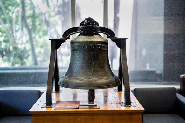 The historic Academy Bell is on display in the Van Pelt Library.