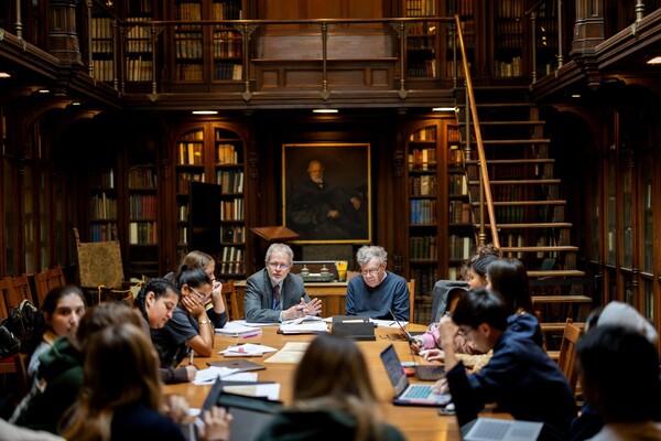 Students at a table in a class in the Lea Library