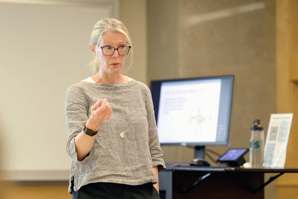 Kara Finck lecturing.