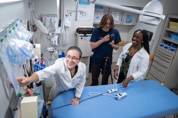 CHOP physicians Elizabeth Sanseau (left) and Vanessa Denny (right) with Kyle Cassidy of the Annenberg Extended Reality Lab (center) demonstrate how modules of Annenberg Hotkeys, a free, openly accessible interactive distance learning platform, are filmed.