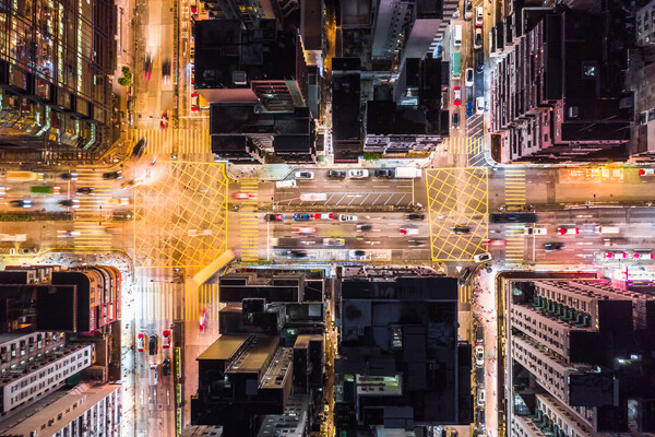 Aerial view of city streets and traffic.