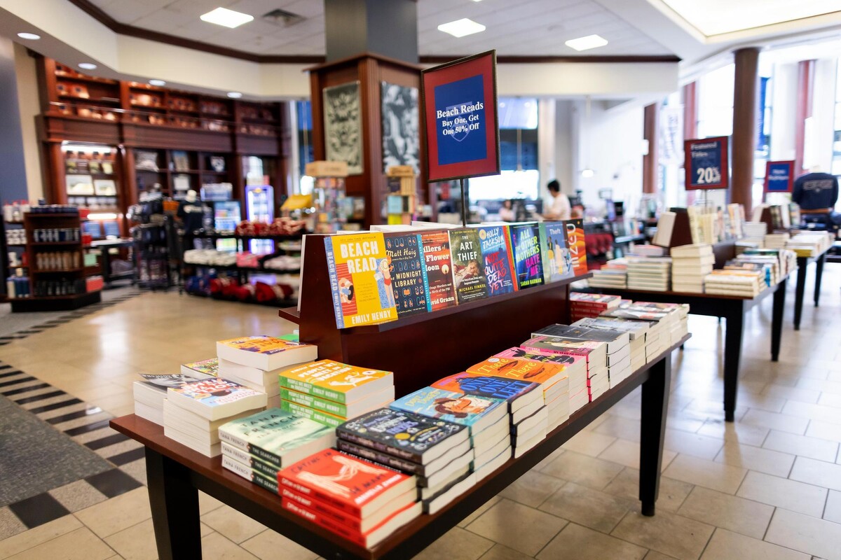 Beach reads display table at bookstore.