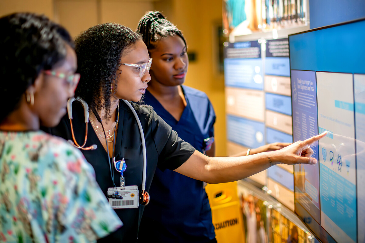 Three Nurses using smart tv technology