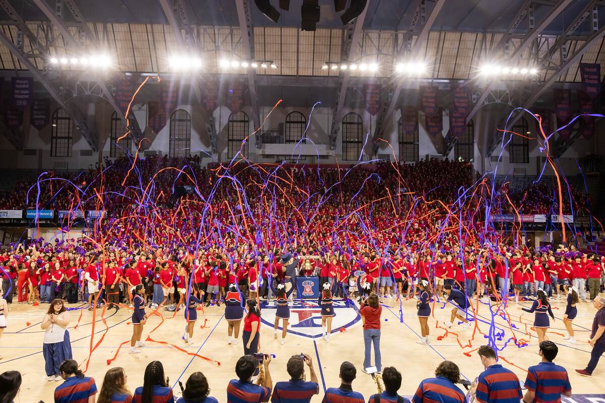 Penn’s class of 2030 in the Palestra with streamers in the air.