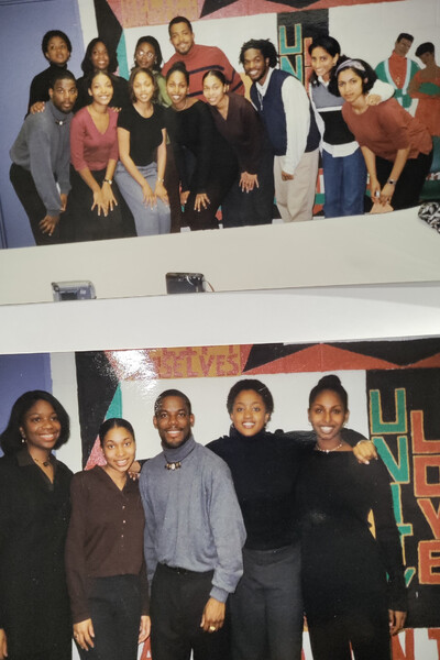 A card showing two images taken during the same spot in the late 1990s, with people grouped around signs that say "UNITY" and "LOVE"
